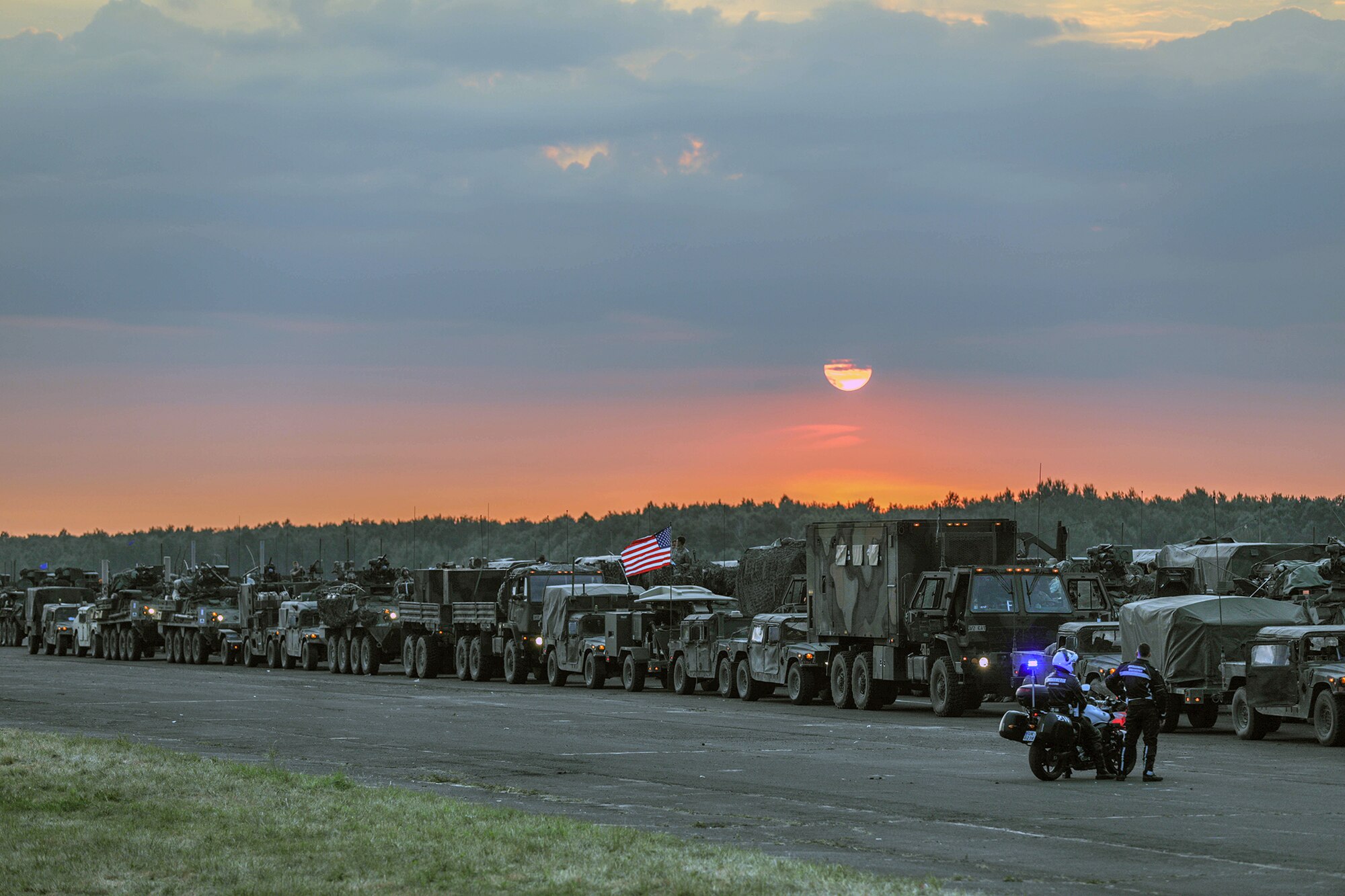 Strykers and military support vehicles belonging to the 3rd Squadron, 2d Cavalry Regiment stage for departure in Sochazcew, Poland, June 18, 2018.