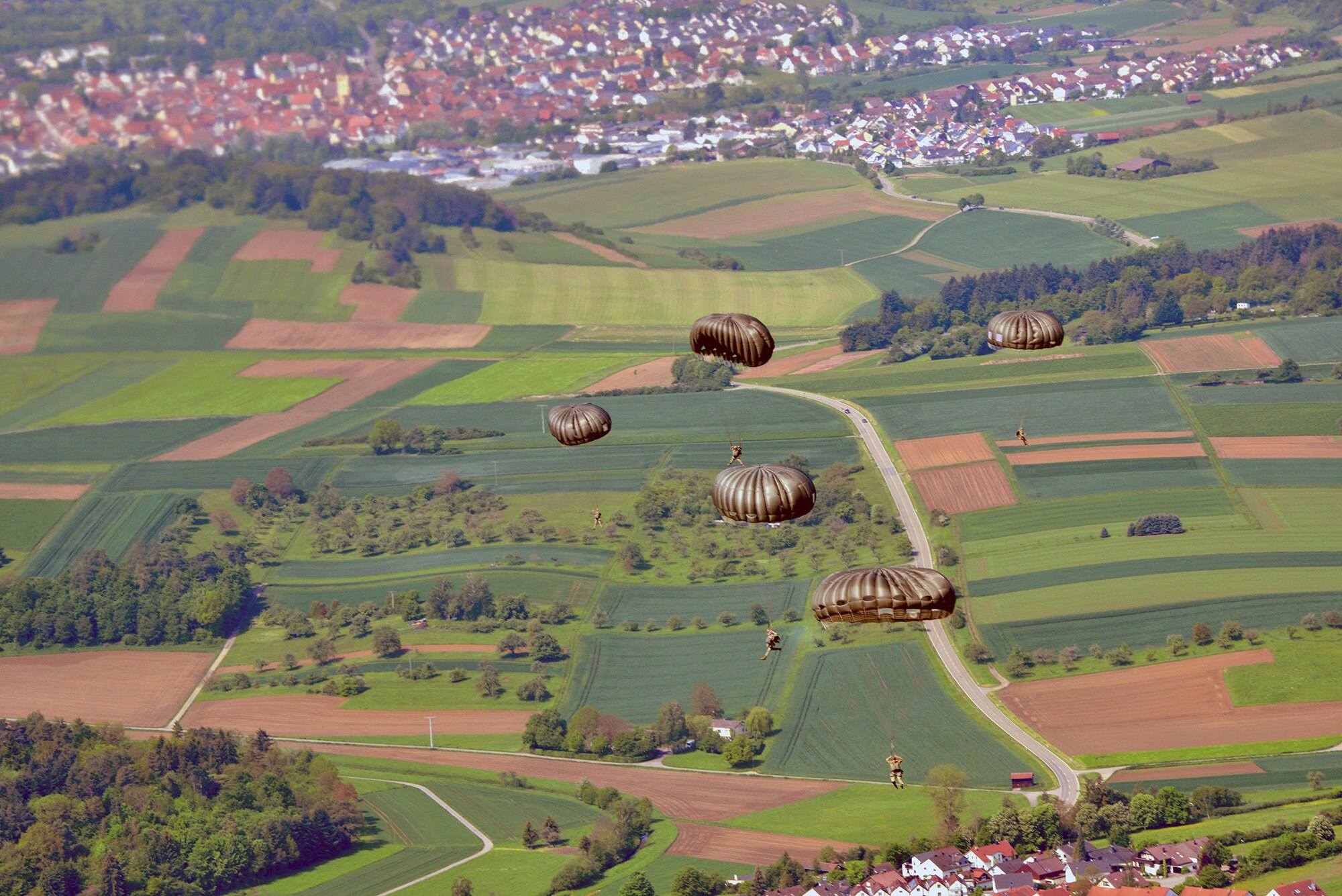 Paratroopers from U.S. Special Operations Commands Africa and Europe perform an airborne operation out of a U.S. Air Force C-130, at Malmsheim Airfield, Germany, May 23, 2019.