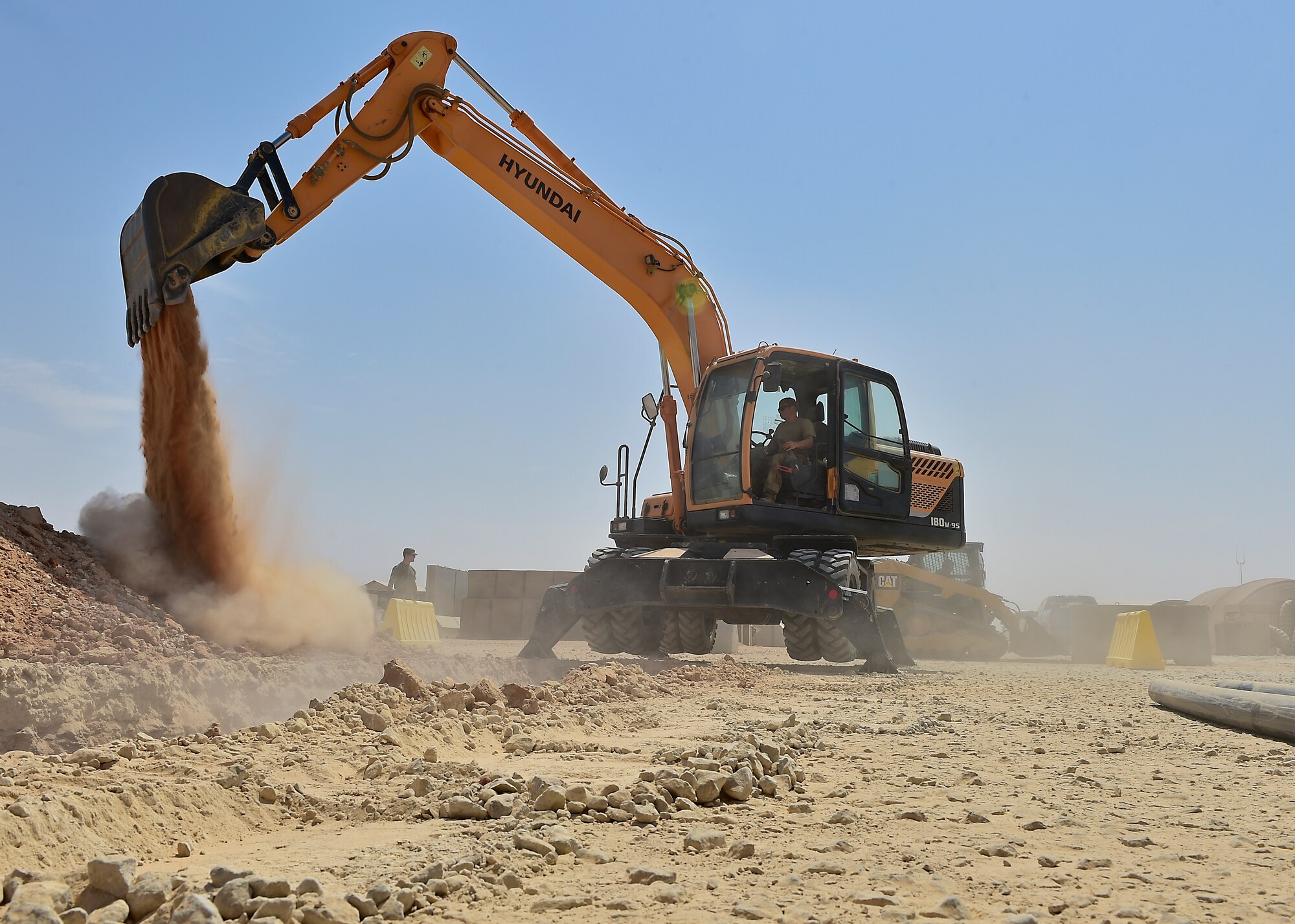 Airmen from the 378th Expeditionary Civil Engineer Squadron construct water and sewer lines at Prince Sultan Air Base, Kingdom of Saudi Arabia, July 28th, 2020.