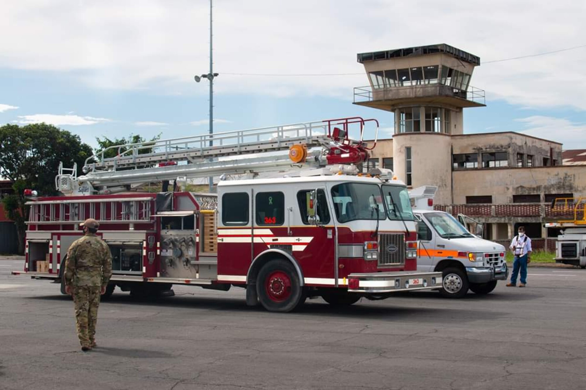 U.S. Air Force Airmen assigned to the 22nd Airlift Squadron, Travis Air Force Base, California, park the emergency vehicles they delivered to Managua, Nicaragua, July 26, 2020. The aircrew delivered humanitarian aid to Nicaragua in support of the Denton Program, a transportation program that allows non-government organizations to donate humanitarian aid to developing countries.  (Courtesy photo)