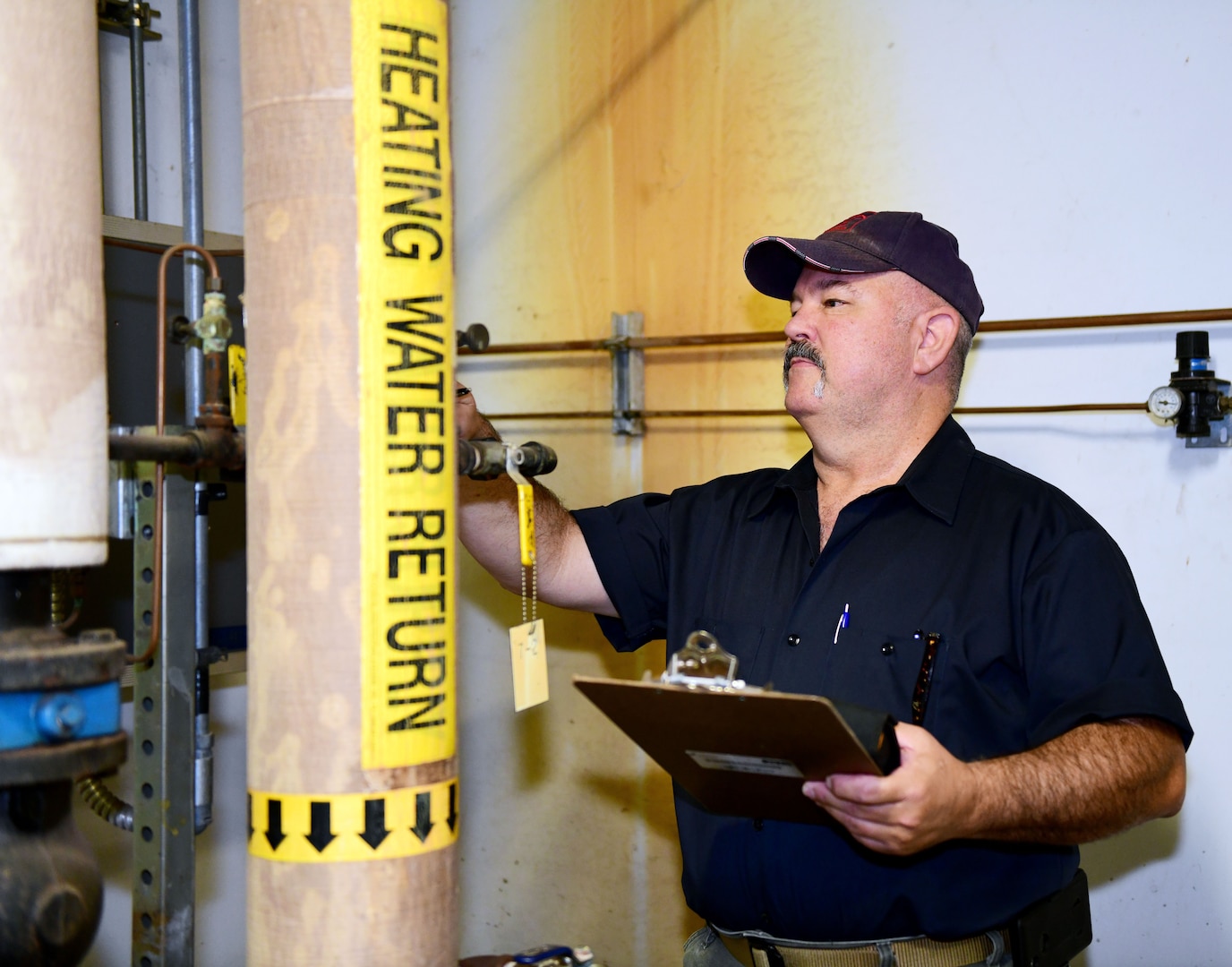 Danny Butler at Robins Air Force Base, Georgia, inventories and assesses the condition of buildings and structures on the base.