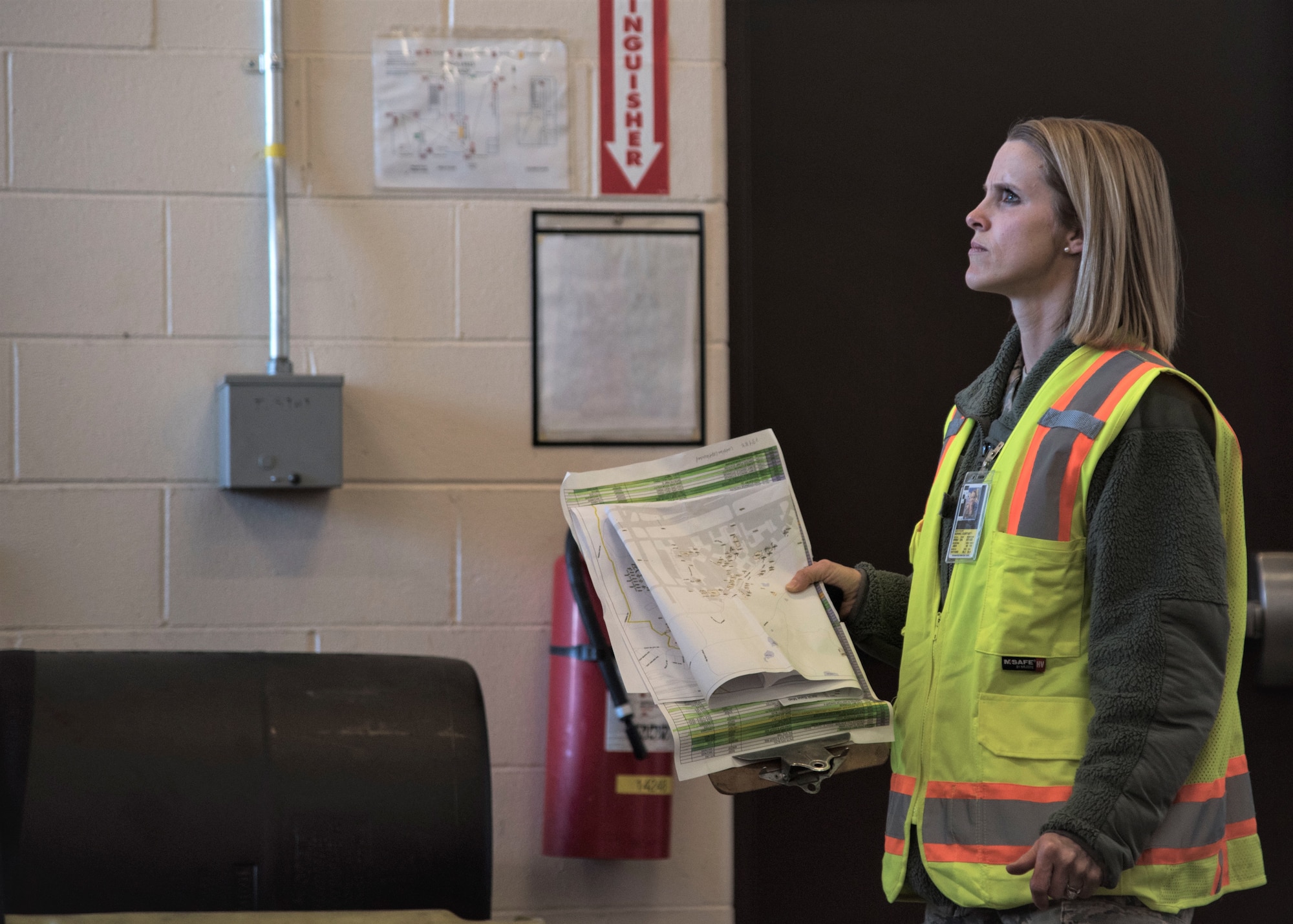 Staff Sgt. Courtney Kohnke performs a post-earthquake inspection on a facility at Joint Base Elmendorf-Richardson, Alaska in January 2019.