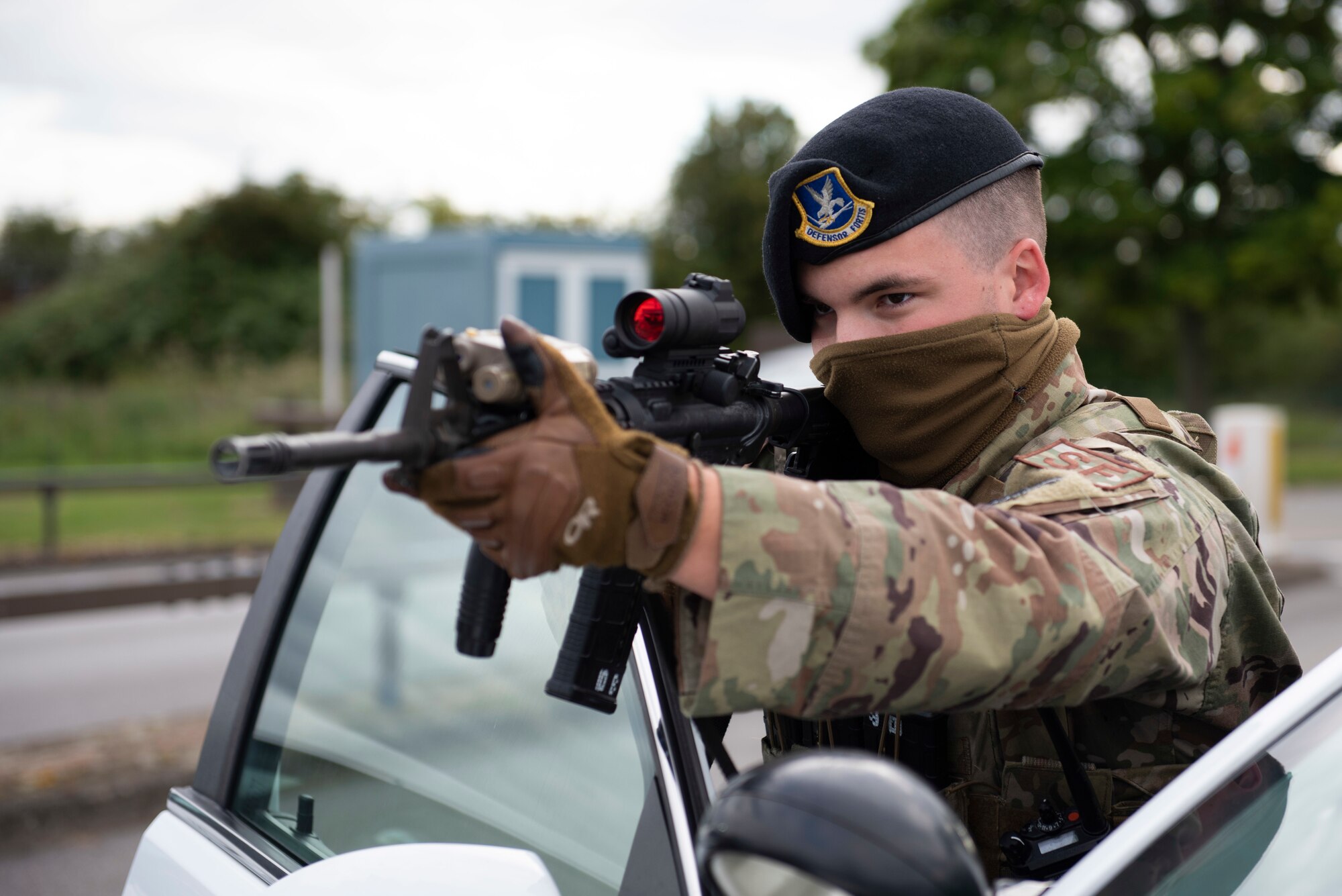 U.S. Air Force Senior Airman Josten Lacey, 423rd Security Forces Squadron (SFS) patrolman, conducts a high risk vehicle challenge during a training exercise at RAF Molesworth, England, July 28, 2020. 423rd SFS defenders conduct regular training and exercises to ensure mission readiness. (U.S. Air Force photo by Airman 1st Class Jennifer Zima)