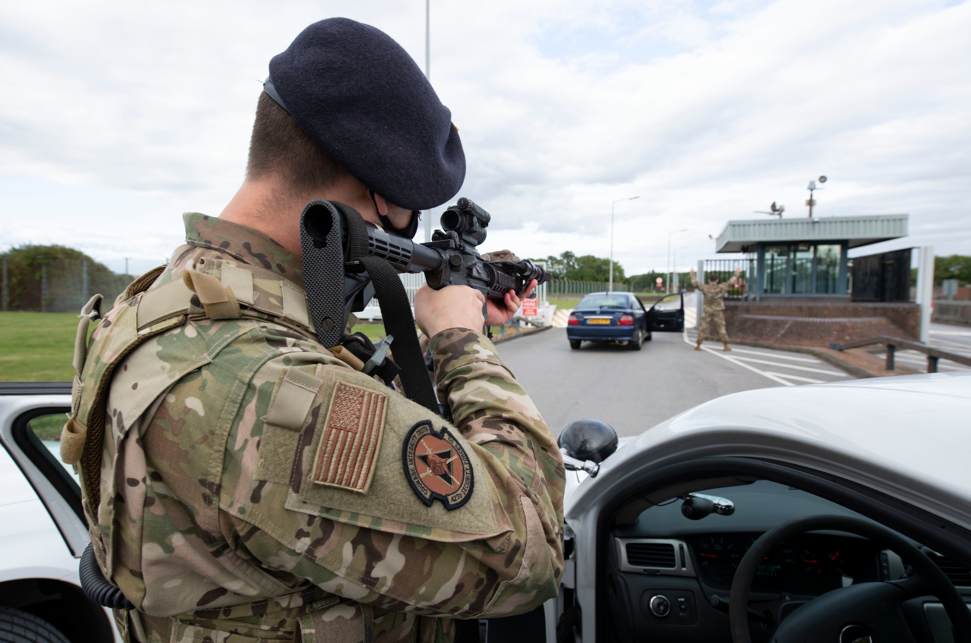 U.S. Air Force Staff Sgt. Derek Ricks, 423rd Security Forces Squadron (SFS) patrolman, conducts a high risk vehicle challenge during a training exercise at RAF Molesworth, England, July 28, 2020. 423rd SFS defenders conduct regular training and exercises to ensure mission readiness. (U.S. Air Force photo by Airman 1st Class Jennifer Zima)