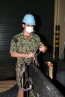 Shop 67HS’s Machinist Mate Second Class Derek Boulanger prepares a high data rate antenna for transport to the Virginia class submarine USS Washington (SSN 787).