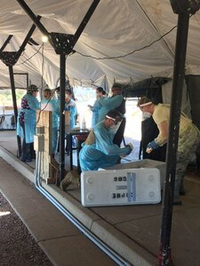 Colorado National Guard members prepare a COVID-19 testing site in Canon City, Colorado, July 29, 2020.