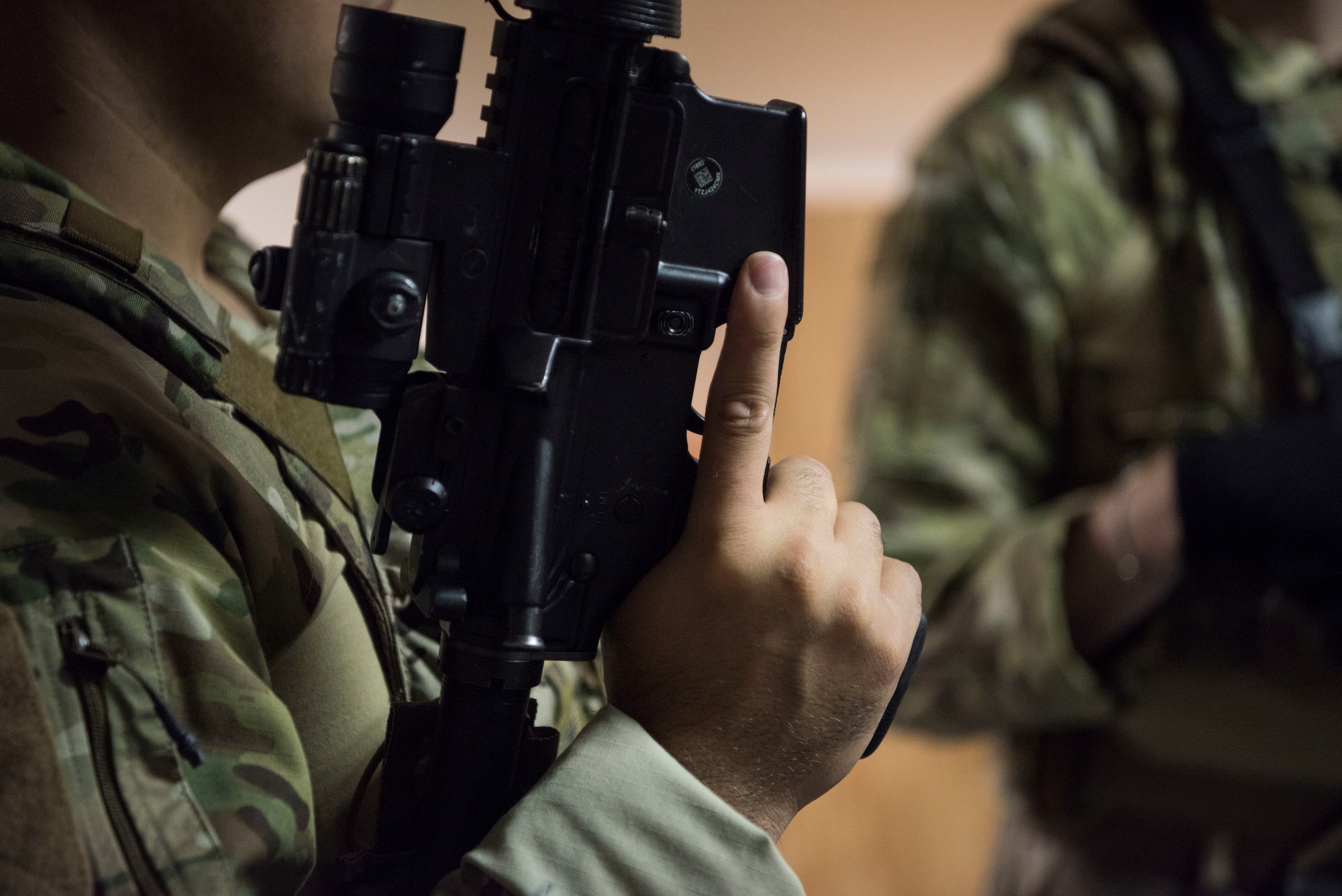 A U.S. Air Force Airman assigned to the 435th Security Forces Squadron practices trigger discipline during close quarters battle training.