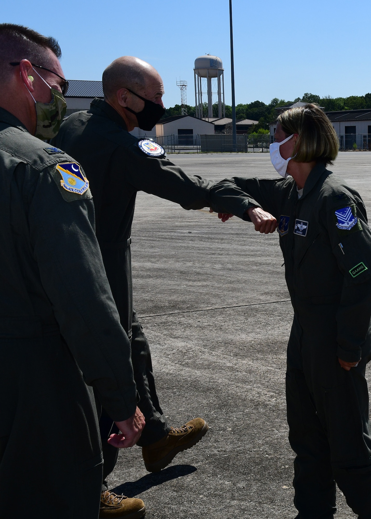 U.S. Air Force Col. Amy Holbeck, 116th Air Control Wing commander, Georgia Air National Guard, welcomes Gen. Mike Holmes, commander of Air Combat Command, to Team JSTARS at Robins Air Force Base, Georgia, July 20, 2020. Holmes is responsible for organizing, training, equipping and maintaining combat-ready air, space, cyber and intelligence forces for rapid deployment and employment while ensuring strategic air defense forces are ready to meet the challenges of peacetime air sovereignty and wartime defense. (U.S. Air National Guard photo by Barry Bena)