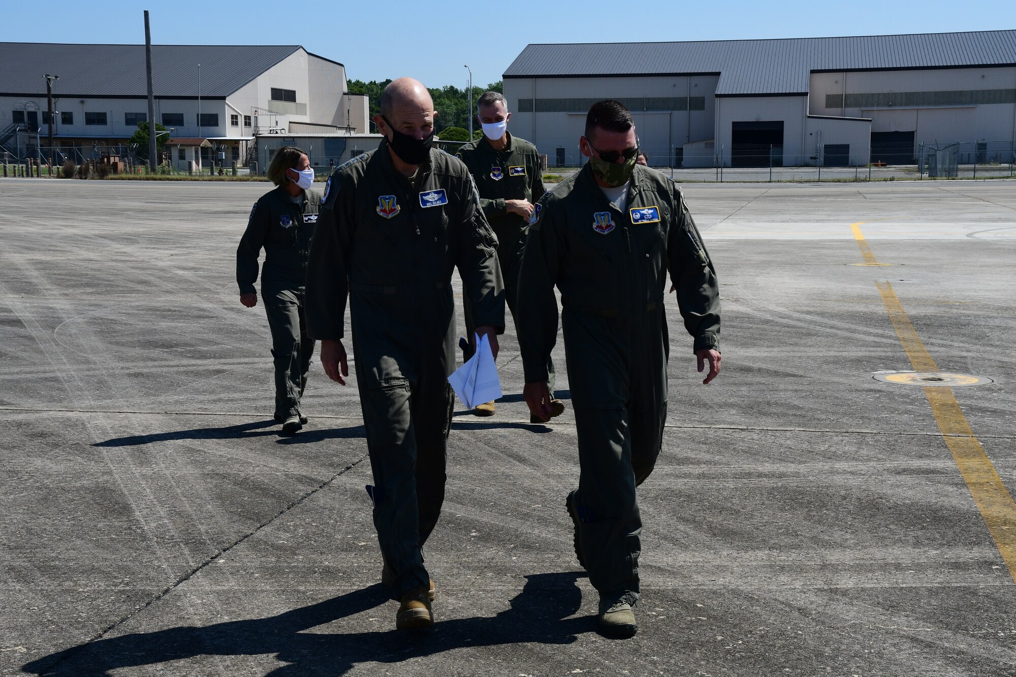 U.S. Air Force Col. Edward Goebel, 461st Air Control Wing commander, speaks with Gen. Mike Holmes, commander of Air Combat Command, as he arrives to speak to Team JSTARS Airmen at Robins Air Force Base, Georgia, July 20, 2020. Holmes is responsible for organizing, training, equipping and maintaining combat-ready air, space, cyber and intelligence forces for rapid deployment and employment while ensuring strategic air defense forces are ready to meet the challenges of peacetime air sovereignty and wartime defense. (U.S. Air National Guard photo by Barry Bena)