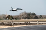 A T-38C Talon lands at the Joint Base San Antonio-Seguin Auxiliary Airfield during a ribbon-cutting event signifying the reopening of the airfield Jan. 20, 2015, after completion of a three-year construction project. The airfield continues to serve the 12th Flying Training Wing’s mission while meeting the challenges posed by the novel coronavirus pandemic.