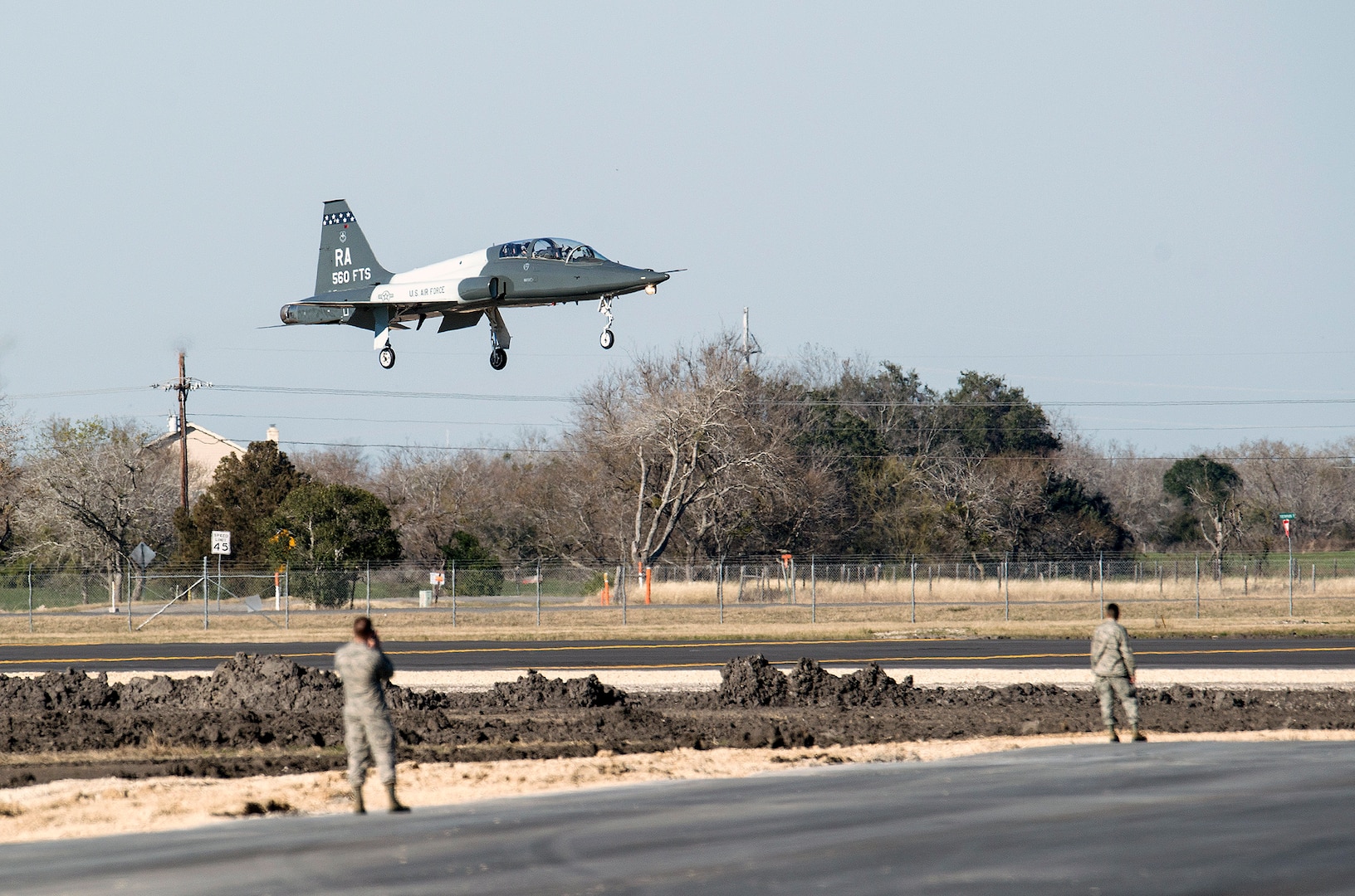 A T-38C Talon lands at the Joint Base San Antonio-Seguin Auxiliary Airfield during a ribbon-cutting event signifying the reopening of the airfield Jan. 20, 2015, after completion of a three-year construction project. The airfield continues to serve the 12th Flying Training Wing’s mission while meeting the challenges posed by the novel coronavirus pandemic.