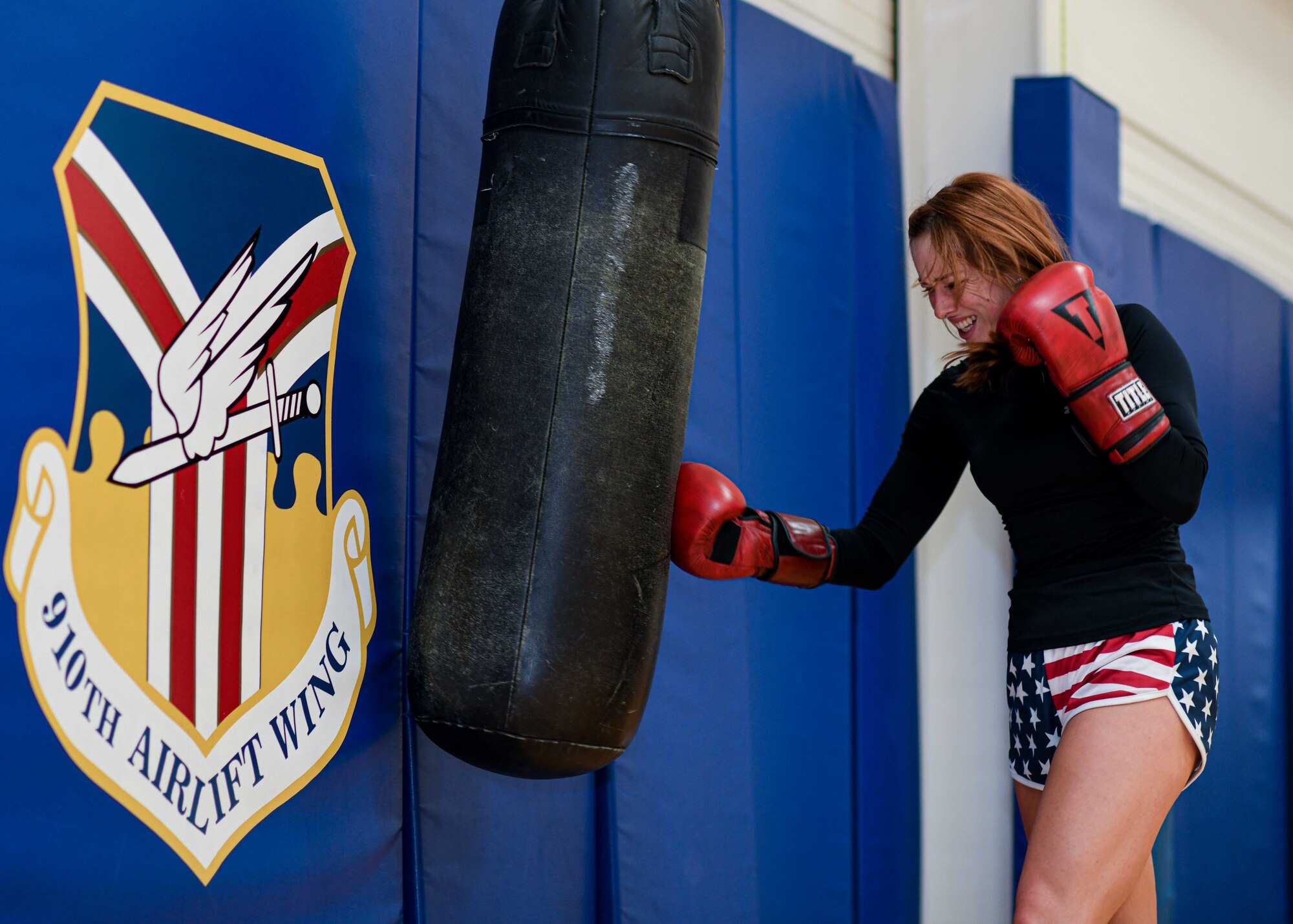 Senior Airman Sarah Jane Gruber, a broadcast journalist for the 910th Public Affairs Office, throws a right uppercut to a heavy bag, July 11, 2020, Lt. Col. H. James English Memorial Fitness Center, Youngstown Air Reserve Station. Gruber competes in Women’s Amateur Boxing for USA Boxing’s Great Lakes Region and has trained in boxing for four years.