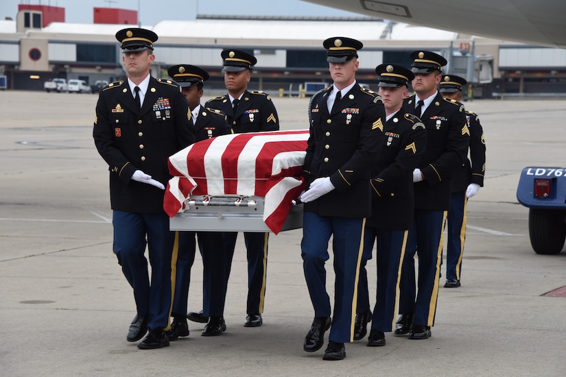 The Pennsylvania National Guard’s Military Funeral Honors detail conducts a dignified transfer of remains for U.S. Army Cpl. Jackey Dale Blosser on July 30, 2020, at Pittsburgh International Airport. Blosser, of Randolph County, West Virginia, went missing in action on Dec. 2, 1950, during the Korean War. (U.S. Air National Guard Photo by Senior Master Sgt. Shawn Monk)