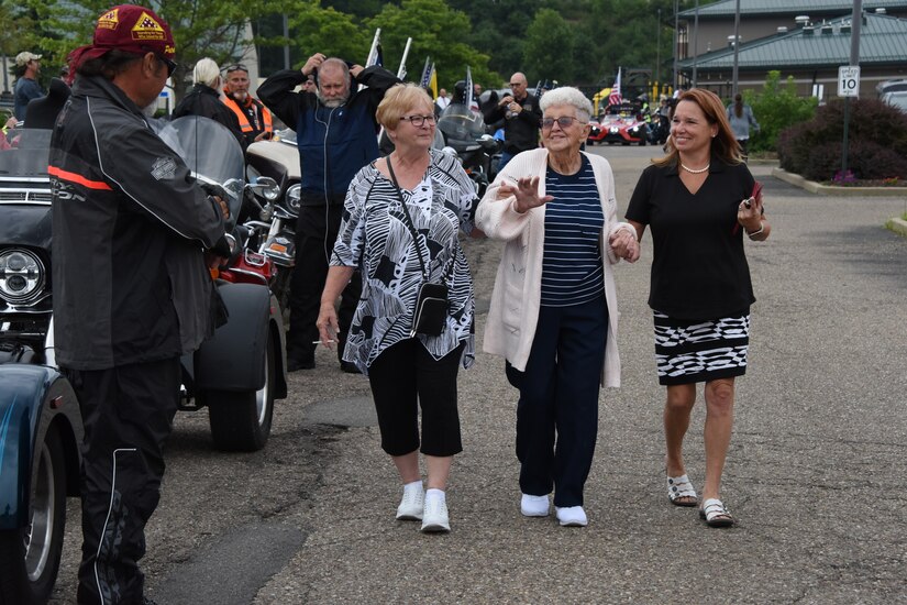 Relatives of U.S. Army Cpl. Jackey Dale Blosser, from left, Linda Koss, Bonnie Shingleton who is Cpl. Blosser’s Sister, and Kimberly White, say thank you to members of the Patriot Guard Riders who provided vehicle escort for the funeral procession near Pittsburgh on July 30, 2020. Blosser, of Randolph County, West Virginia, went missing in action in Korea Dec. 2, 1950, during the Korean War. (U.S. Air National Guard Photo by Senior Master Sgt. Shawn Monk)
