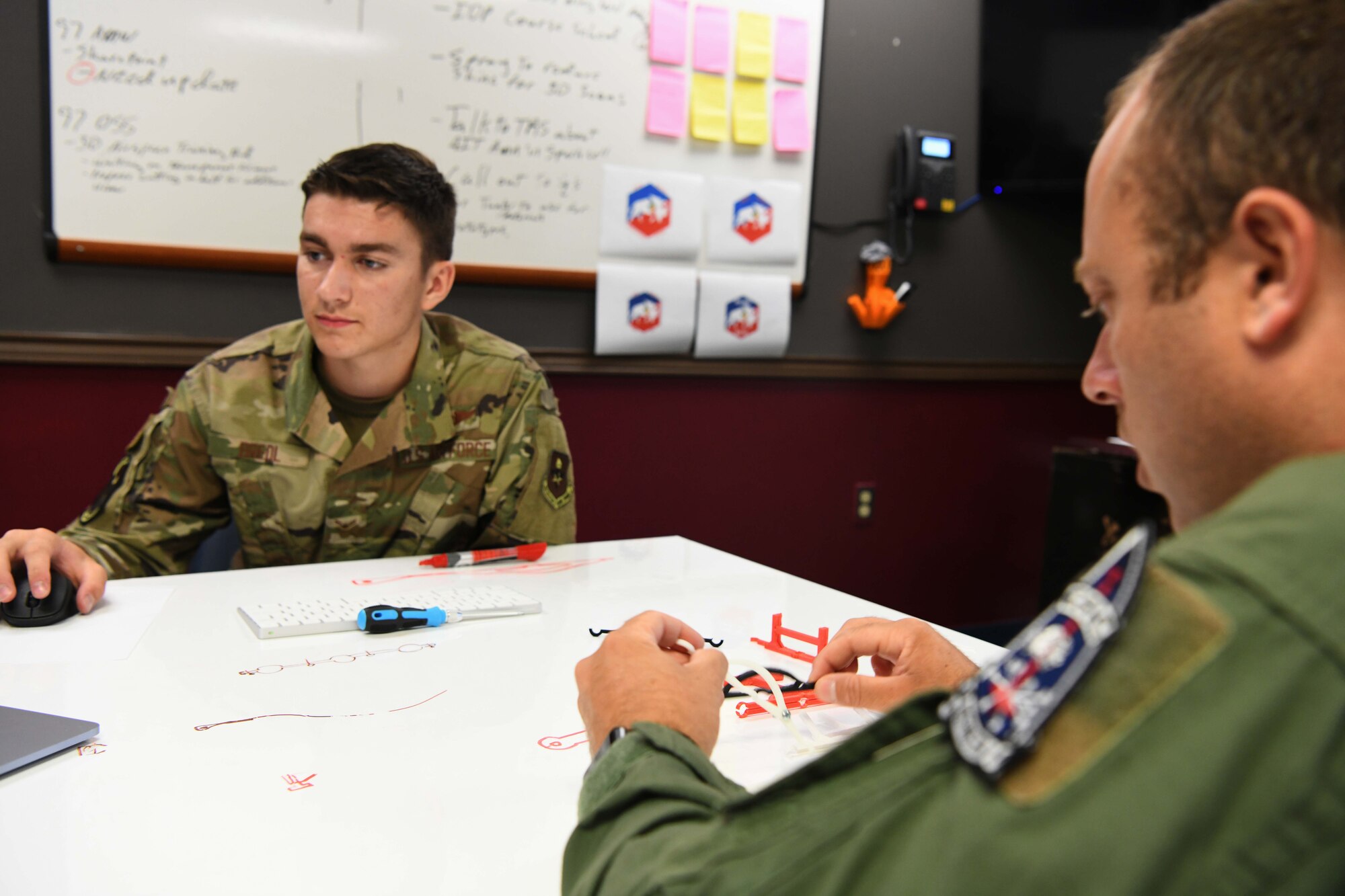 Students design KC-135 part.