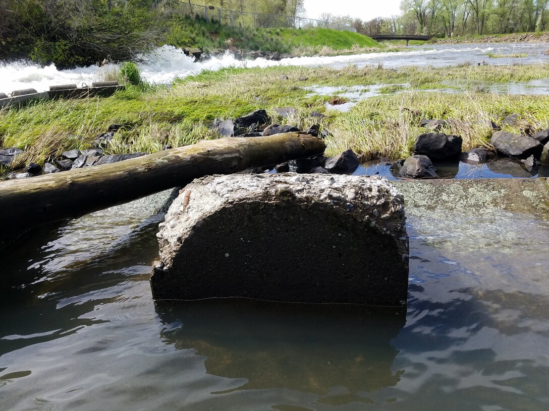 “The current diffuser blocks are original to the dam, which was completed in 1942. While the blocks were utilized every year for the past 78 years, they have sustained freeze-thaw damage over the years. The likely culprit for their current distress is the method in which they were constructed,” Natural Resources Specialist Jeremy Nguyen said.