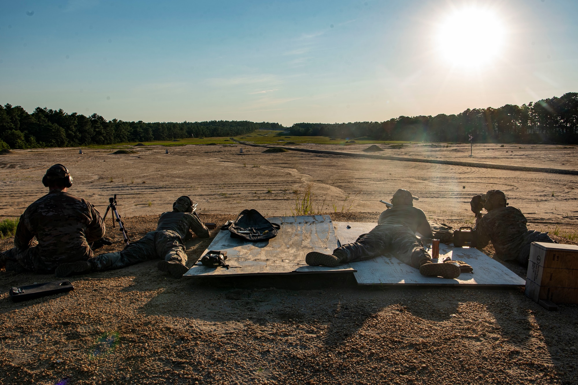 Photo of Airmen attending an M24 sniper rifle qualification and proficiency training session.