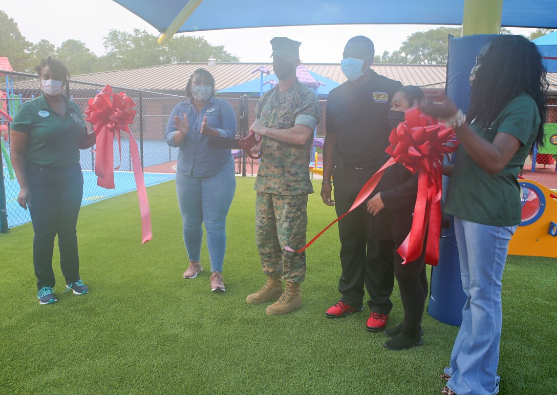 A project to bring in a refreshed playground at the Child Development Center aboard Marine Corps Logistics Base Albany came to fruition with a ribbon-cutting on July 31. (U.S. Marine Corps photo by Jennifer Parks)