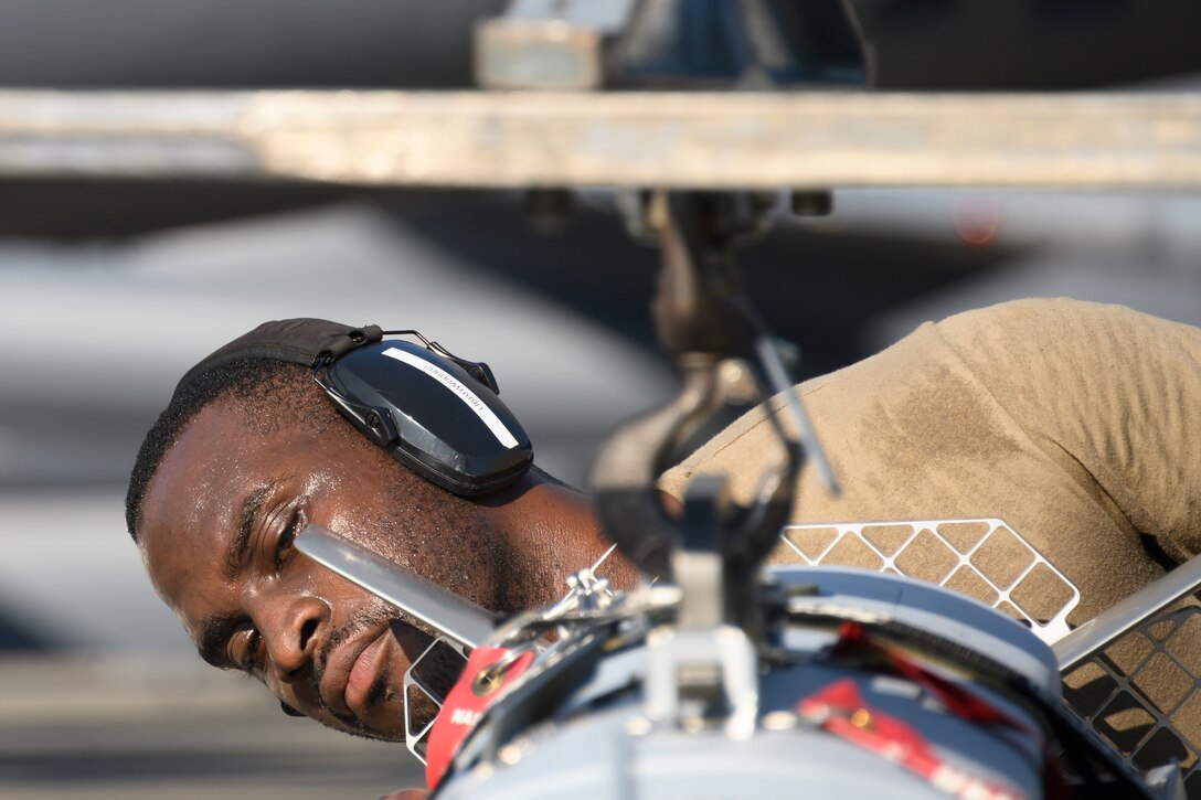Photo of Airman working on flightline.
