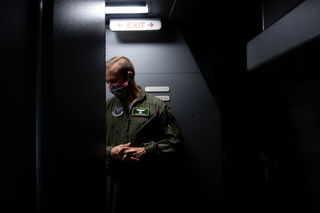Photo of Airman looking at a jet.