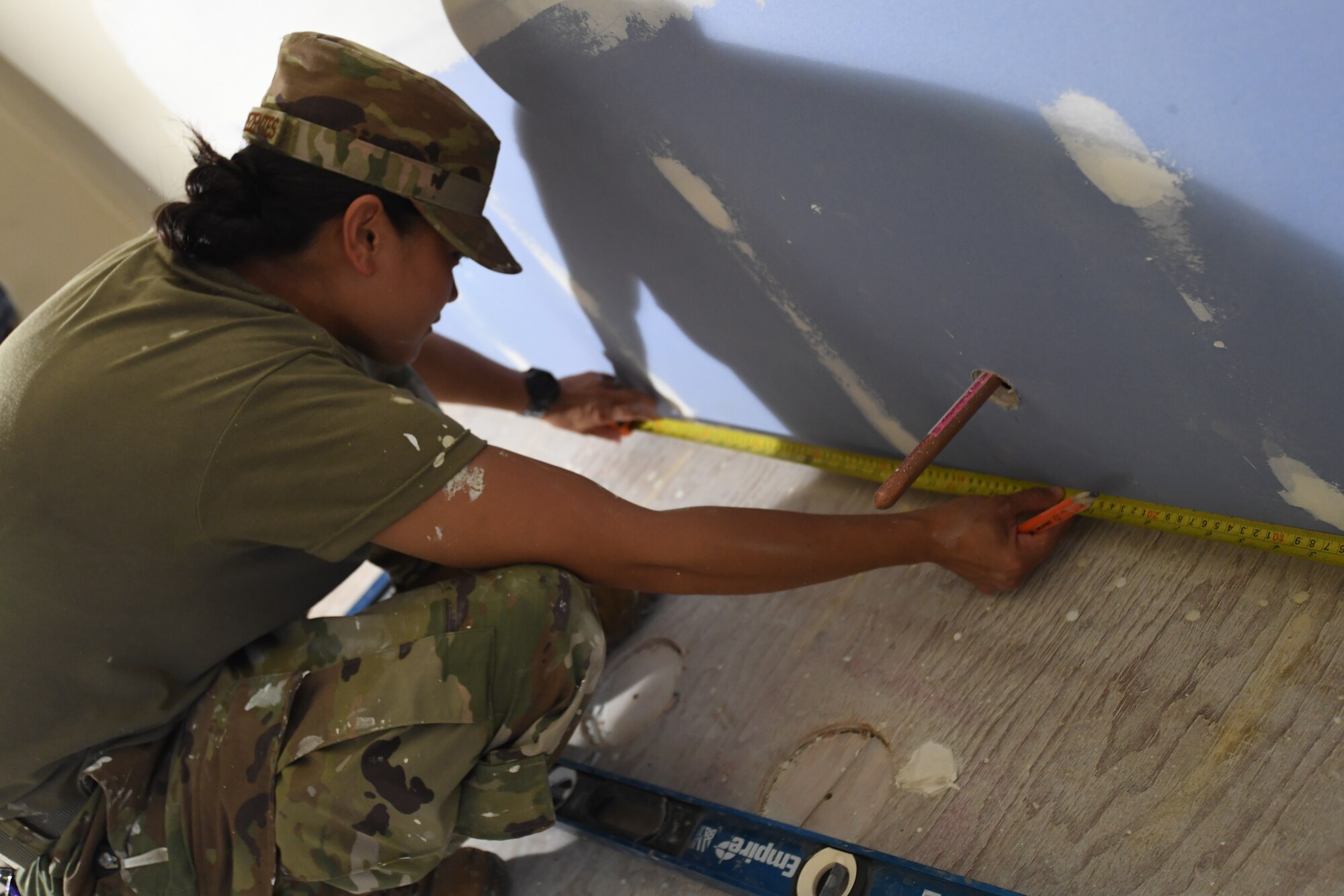 A photo of U.S. Air Force Senior Airman Angie Yoshize-Rezentes, 624th Civil Engineer Squadron structures specialists, taking measurements for facility repairs at Bellows Air Force Station, Hawaii, July 22, 2020, during the unit’s Annual Training. The U.S. Air Force Reserve’s 624th CES provided necessary repairs at Bellows AFS, a Military Welfare and Recreation facility that supports military families and communities, to improve infrastructure and increase individual readiness skills. (U.S. Air Force photo by Tech. Sgt. Garrett Cole)