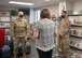 Col. Jason Bell, 432nd Wing/432nd Air Expeditionary Wing vice commander and Col. Dina Quanico, 432nd Mission Support Group commander, tour the newly renovated consolidated support center at Creech Air Force Base.