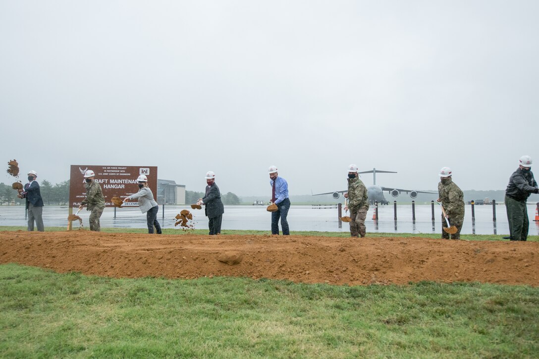 (From left) David Marchiori, senior vice president of Walsh Construction and Acher Western, Lt. Col. David C. Park, U.S. Army Corps of Engineers, Philadelphia District commander, Courtney McGregor, Delaware state director for Rep. Lisa Blunt Rochester, Sen. Chris Coons, Sen. Tom Carper, Col. Matthew Jones, 436th Airlift Wing commander, Chief Master Sgt. Shae Gee, 436th Airlift Wing command chief and Col. Gregory Haynes, 512th Airlift Wing commander during a ground breaking ceremony for a new hangar, July 31, 2020 at Dover Air Force Base, Del. The hangar will be a fully enclosed fuel cell hangar and the first hangar built on Dover AFB since 1983.
(U.S. Air Force Photo by Mauricio Campino)