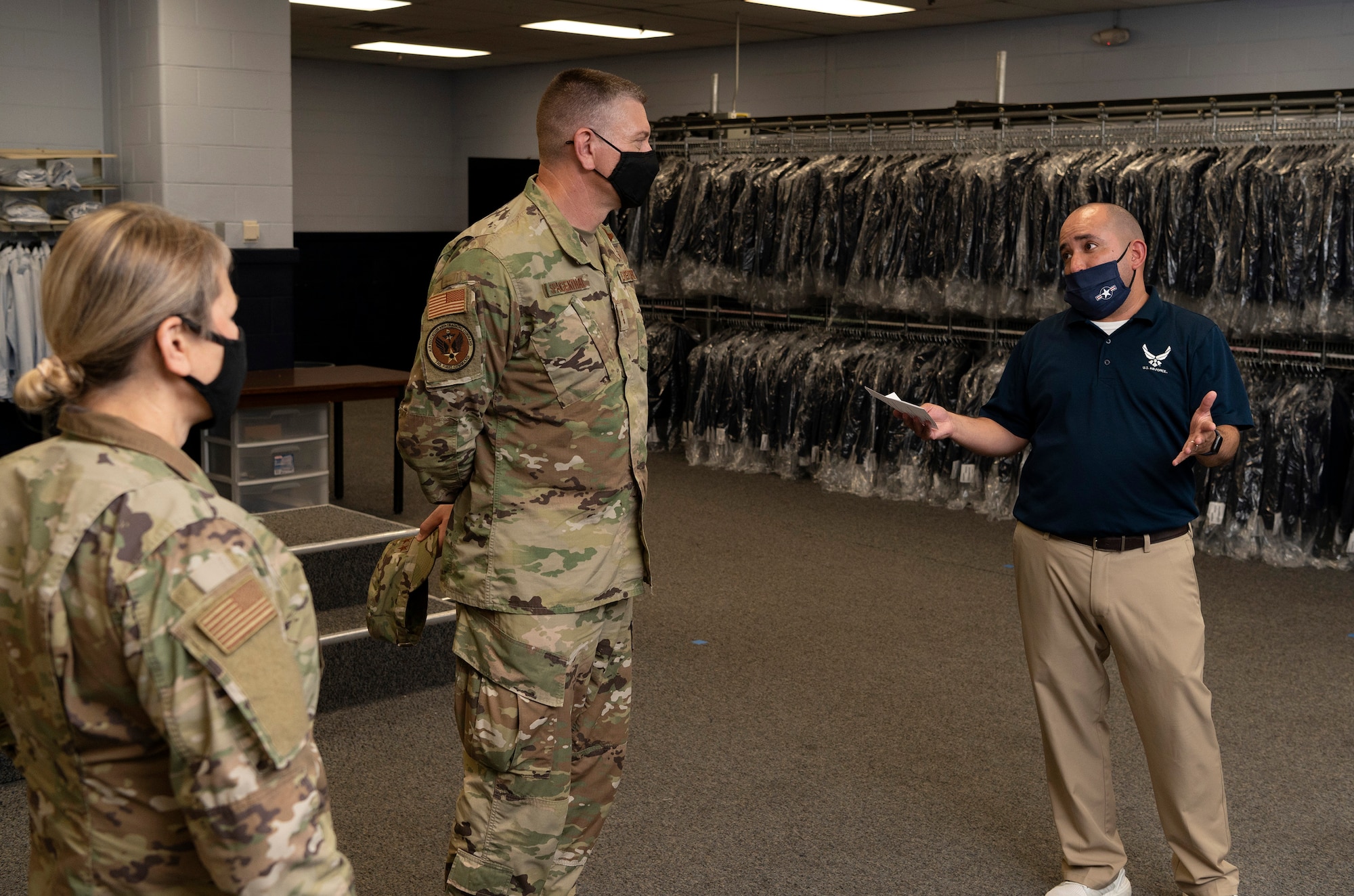 Maj. Gen. William Spangenthal, vice commander of Air Education and Training Command, elbow bumps Lt. Col. Damien Williams, 37th Training Group deputy commander, during an immersion tour June 24, 2020, at JBSA-Lackland, Texas.