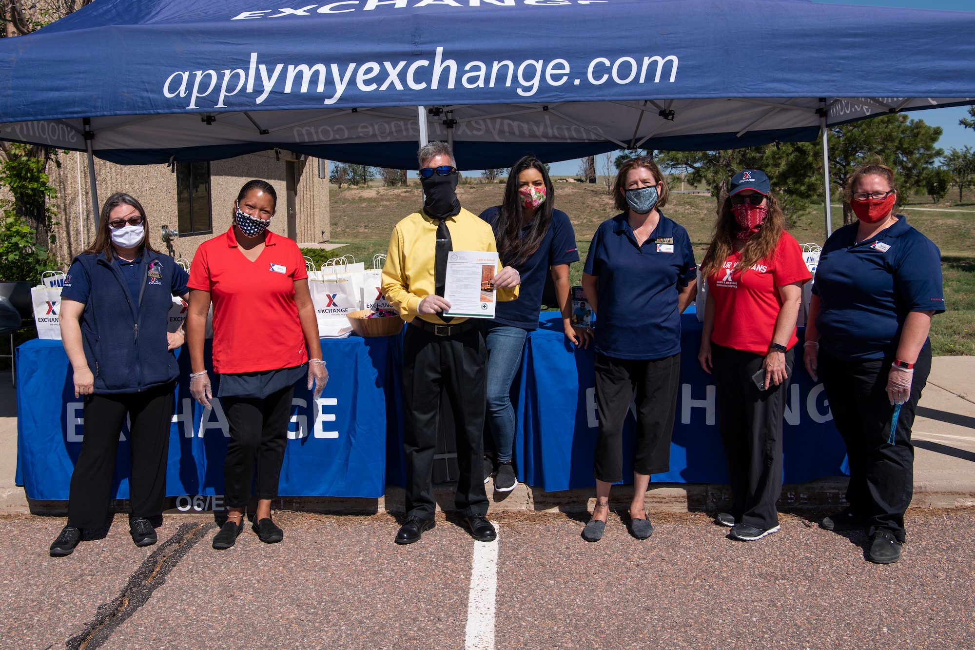 Employees from the Army and Air Force Exchange Service volunteered to give out free school supplies during a back-to-school drive July 31, 2020, at Schriever Air Force Base, Colorado. AAFES handed out free pencils, sunglasses, tissues, coloring books and more to Schriever families. (U.S. Air Force photo by Airman 1st Class Jonathan Whitely)