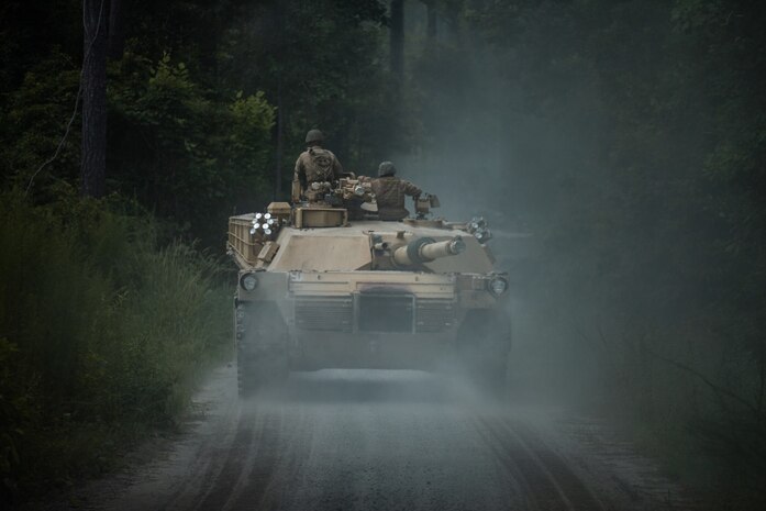 U.S. Marines with 2d Tank Battalion, 2d Marine Division, track through tank trails on Camp Lejeune, North Carolina, July 27, 2020. For nearly 80 years, 2d Tank Battalion left the tank lot and would return after combat or training operations. This time, the tanks will not return. After serving 2d MARDIV for more than three quarters of a century, 2nd Tank Battalion will deactivate in response to a future redesign of the Marine Corps. (U.S. Marine Corps photo by Lance Cpl. Patrick King)