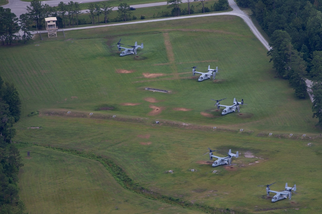 MV-22B Ospreys with Marine Medium Tiltrotor Squadron 266, VMM-162, VMM-261, and VMM-263, 2nd Marine Aircraft Wing, land during Exercise Deep Water 2020 at Marine Corps Air Station New River, N.C., July 29, 2020. The purpose of the exercise is to increase 2nd Marine Aircraft Wing’s interoperability and readiness on a scale that simulates peer-level threats. (U.S. Marine Corps photo by Lance Cpl. Elias E. Pimentel III)