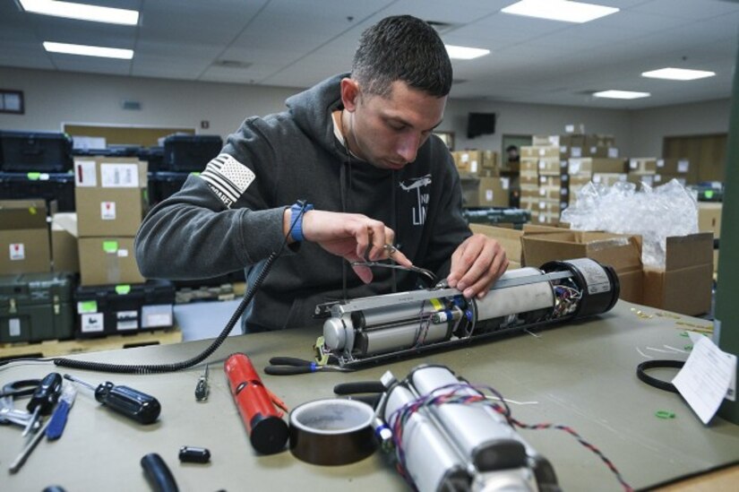 Matt Hernandez repairs an oxygen generator at the U.S. Army Medical Materiel Agency's MMOD-Hill depot at Hill Air Force Base, Utah, on Jan. 10, 2019.