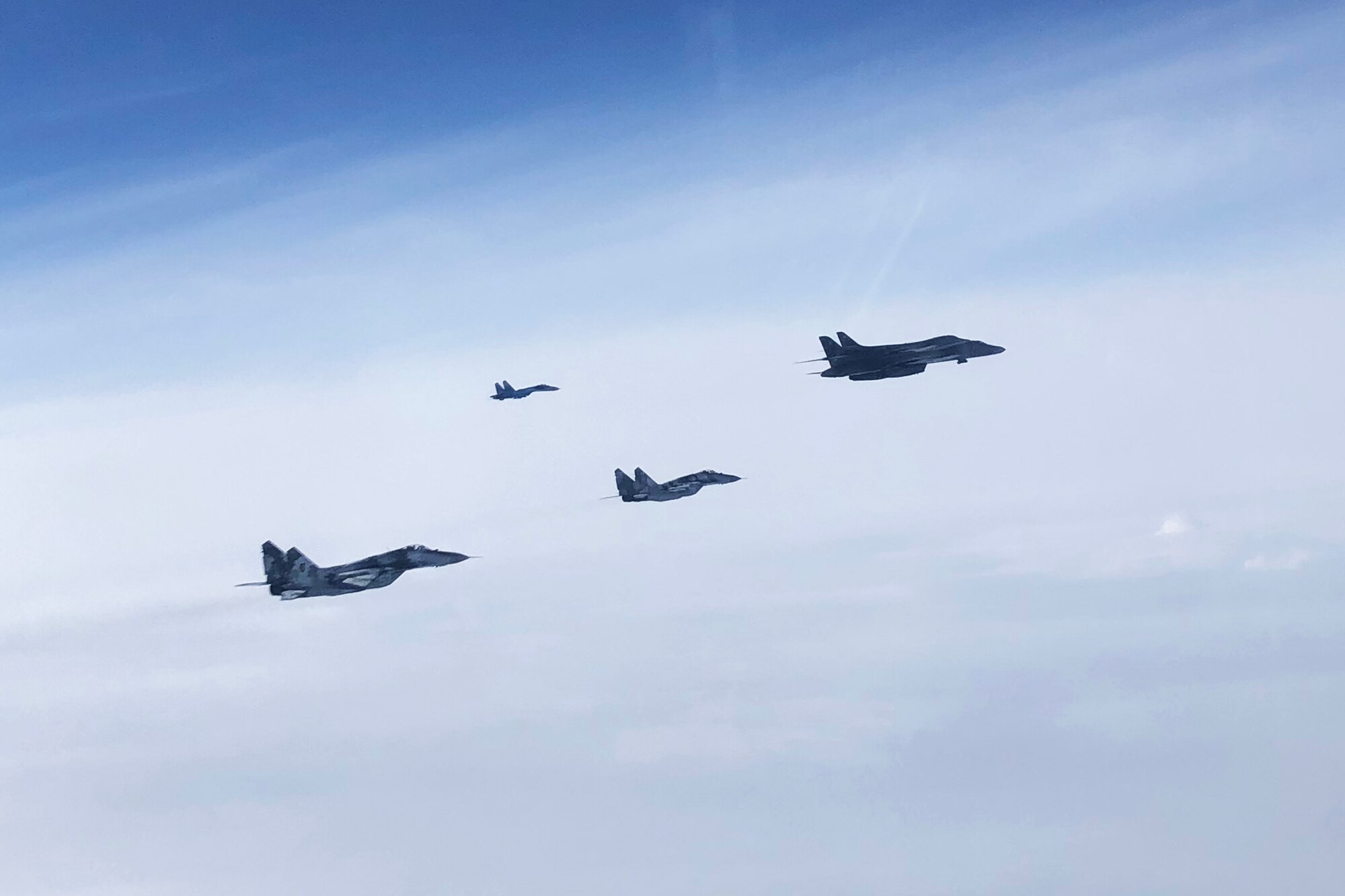 Military aircraft flying