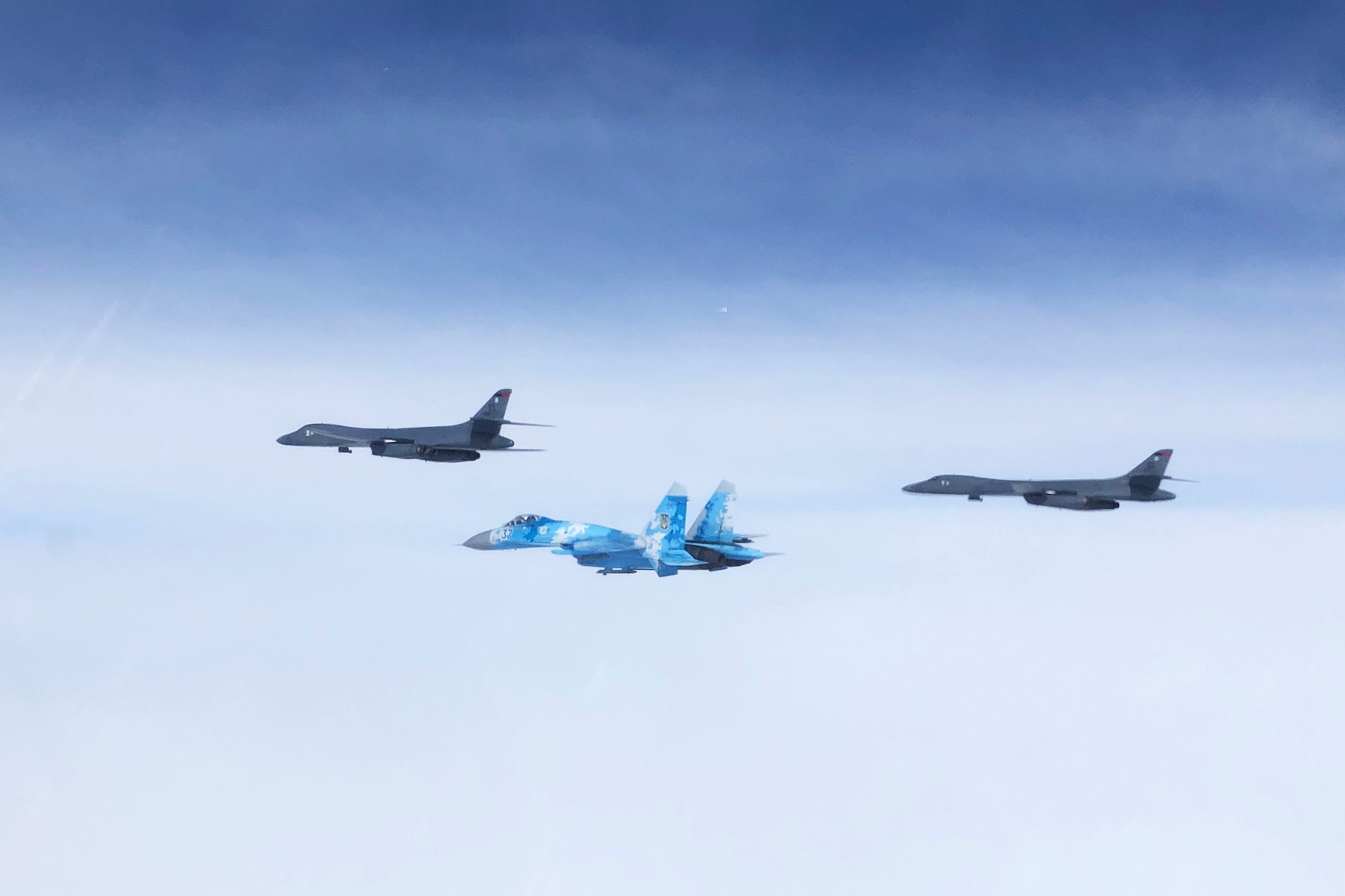 Military aircraft flying