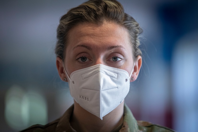 An airman wearing a face mask.