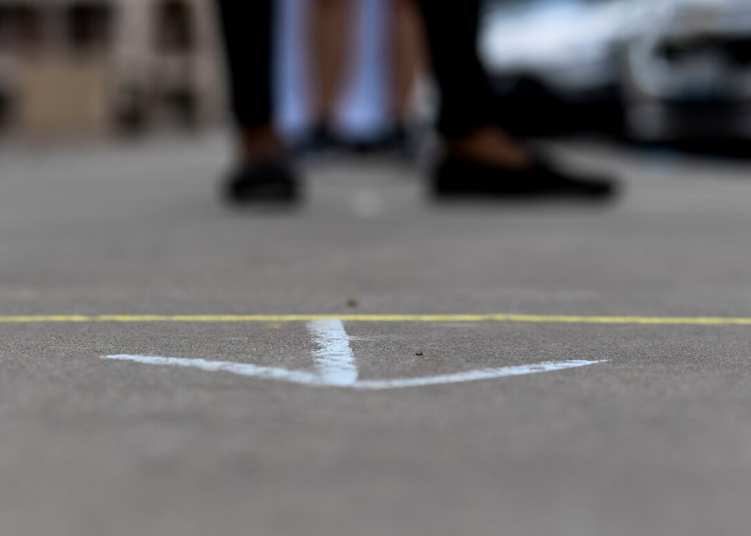 Airmen wait in line.