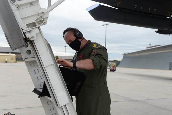 Aviator looks at checklist