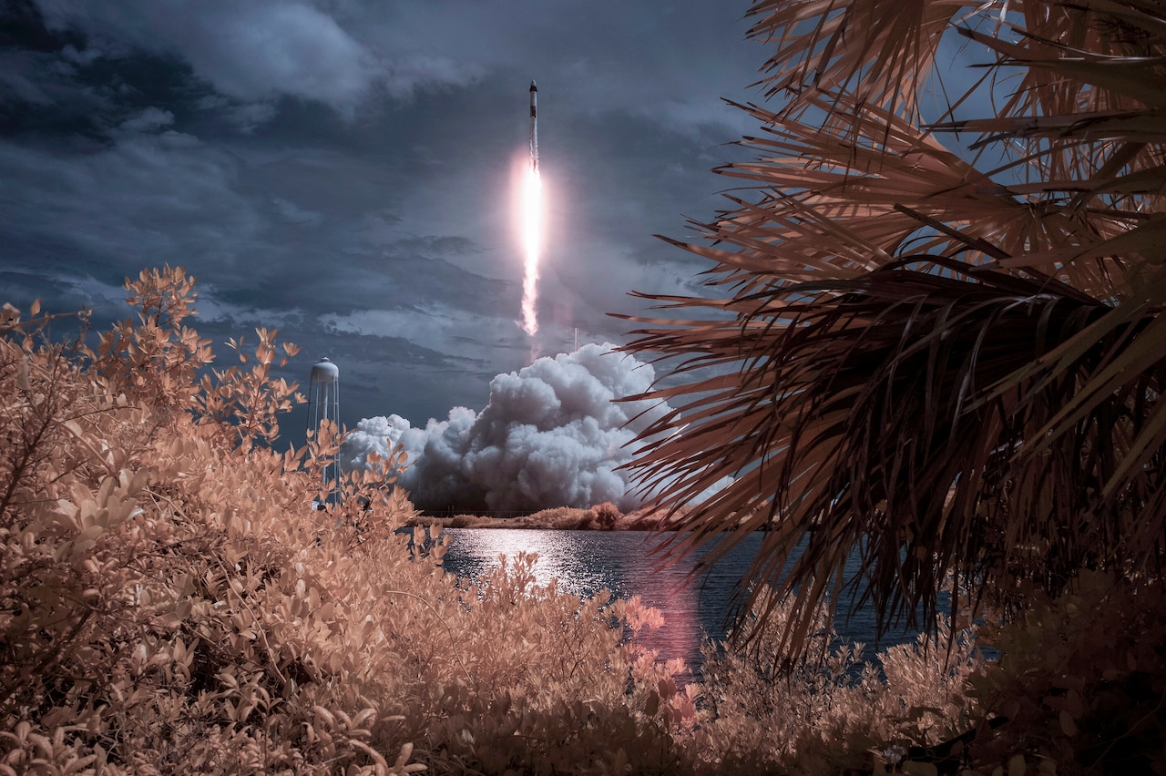 A rocket launches into space.