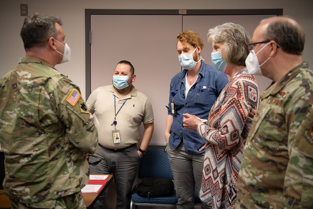 Oklahoma guardsmen conduct contact tracing operations.
