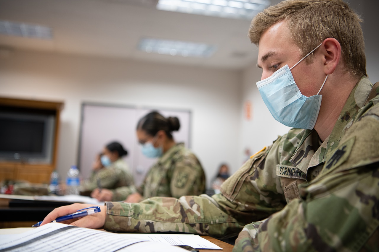 Oklahoma guardsmen conduct contact tracing operations.