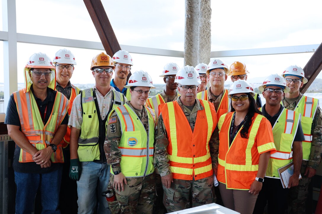 . In the photo, Tim Phillips (second from left) participated in a site visit of the C2F project in March 2020 for the 54th Chief of Engineers and Commanding General of the U.S. Army Corps of Engineers Lt. Gen. Todd Semonite (center). (photo taken during an engagement prior to enforcement of COVID-19 social distancing)