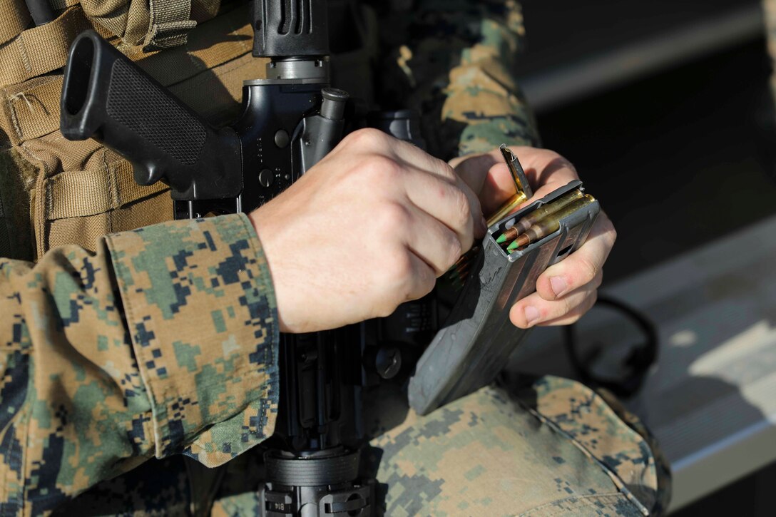 Marines from U.S. Marine Corps Forces Korea were invited to train alongside the 557th Military Police Company here on Camp Humphreys, South Korea, May 14. The joint training allowed the Marines and Soldiers to practice their marksmanship and maintain their overall readiness. (U.S. Marine Corps Photo by Sgt. Parker R. Golz)