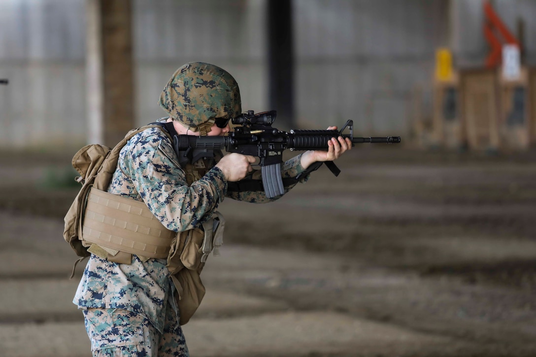 Marines from U.S. Marine Corps Forces Korea were invited to train alongside the 557th Military Police Company here on Camp Humphreys, South Korea, May 14. The joint training allowed the Marines and Soldiers to practice their marksmanship and maintain their overall readiness. (U.S. Marine Corps Photo by Sgt. Parker R. Golz)