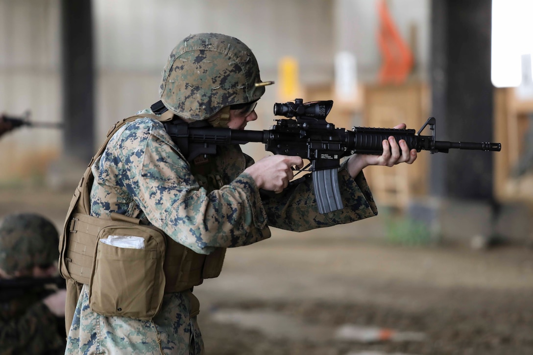 Marines from U.S. Marine Corps Forces Korea were invited to train alongside the 557th Military Police Company here on Camp Humphreys, South Korea, May 27. The joint training allowed the Marines and Soldiers to practice their marksmanship and maintain their overall readiness. (U.S. Marine Corps Photo by Sgt. Parker R. Golz)