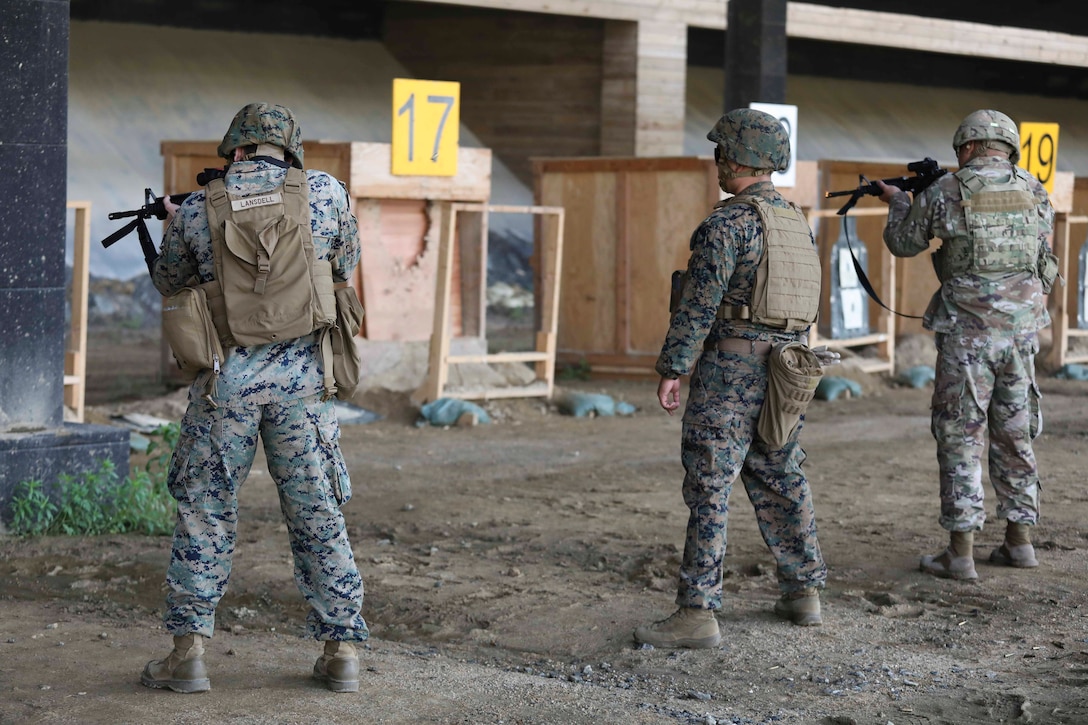 Marines from U.S. Marine Corps Forces Korea were invited to train alongside the 557th Military Police Company here on Camp Humphreys, South Korea, May 27. The joint training allowed the Marines and Soldiers to practice their marksmanship and maintain their overall readiness. (U.S. Marine Corps Photo by Sgt. Parker R. Golz)