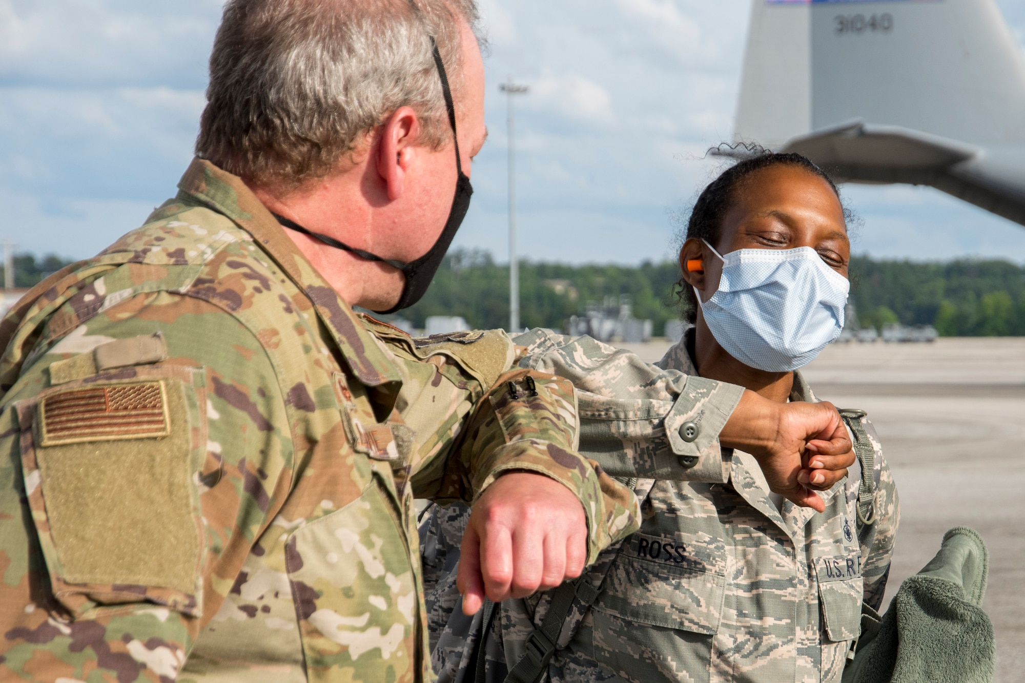 Maj. Enrika Ross, 94th Aeromedical Staging Squadron nursing OIC, greets Col. John Gillespie, 94th ASTS commander, on the flightline at Dobbins Air Reserve Base, Ga. shortly after arriving via a Dobbins C-130H3 Hercules on May 28, 2020. Ross was one of four Dobbins nurses who mobilized to New York City’s Queens Hospital, where she worked as a nurse in the medical-surgical unit as part of the whole-of-government response to the COVID-19 pandemic. (U.S. Air Force photo/Andrew Park)