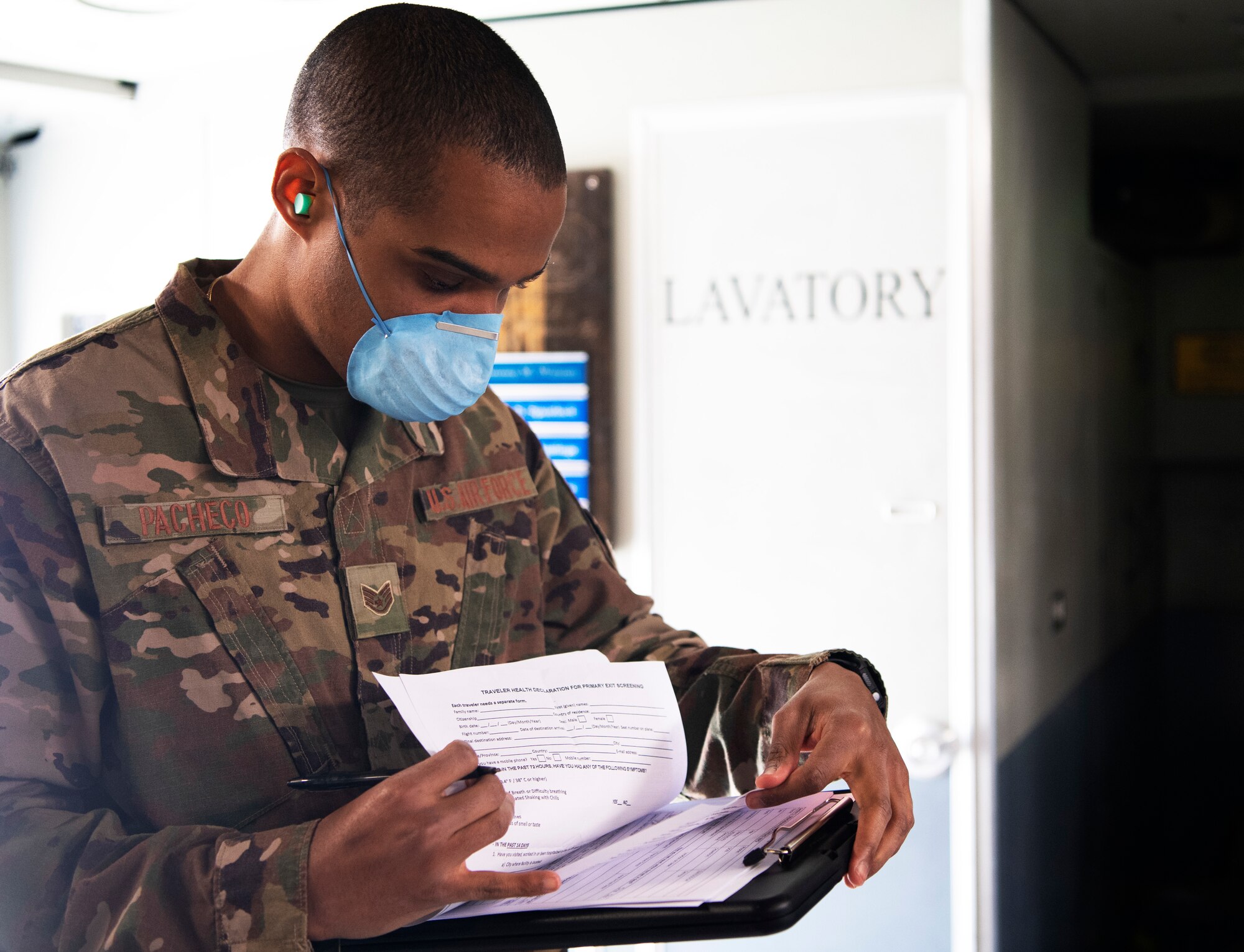 Each medical evaluation form is reviewed by a public health technician for possible symptoms of COVID-19 to help prevent the spread of the virus.