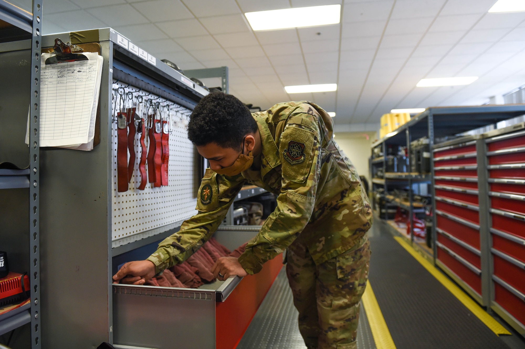 Senior Airman Timothy Shaw, 62nd Maintenance Squadron support section journeyman, checks inventory at the home station check support section on Joint Base Lewis-McChord, Wash., May 20, 2020. The support section provides tools and equipment to maintenance personnel who work on the aircrafts. (U.S. Air Force photo by Airman 1st Class Mikayla Heineck)