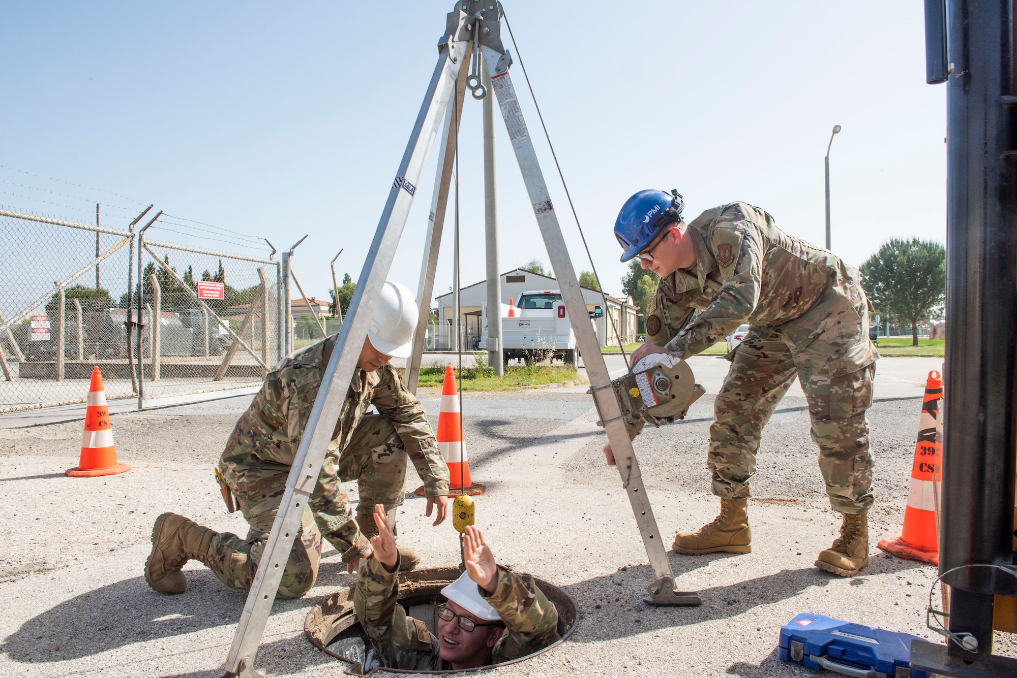 “Cable dawgs” assigned to the 39th Communications Squadron carry their shovels after an afternoon of work May 11, 2020, at Incirlik Air Base, Turkey. Cable and antenna systems Airmen, popularly called “cable dawgs,” are often mistaken for civil engineers because their jobs take place outdoors and involve vigorous manual labor. (U.S. Air Force photo by Staff Sgt. Joshua Magbanua)