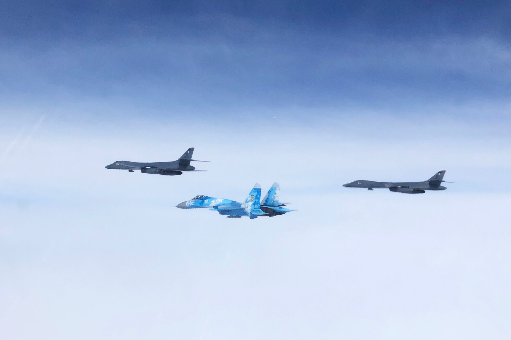 Military aircraft flying